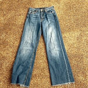 These aeropostal jeans are long, high rise, and wide legged.